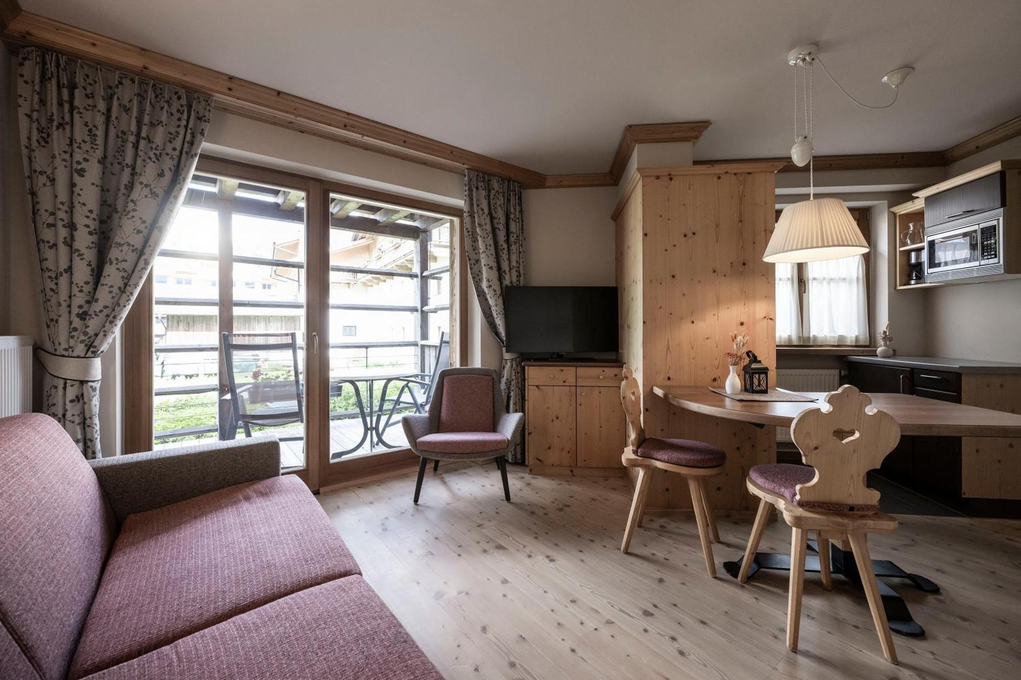 Aparthotel Post Alpina - Family Mountain